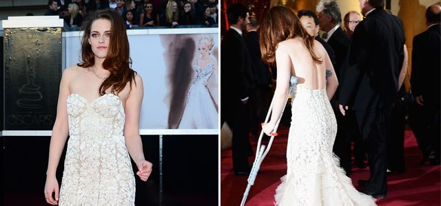 Kristen Stewart aparece sozinha e de muletas no tapete vermelho do Oscar