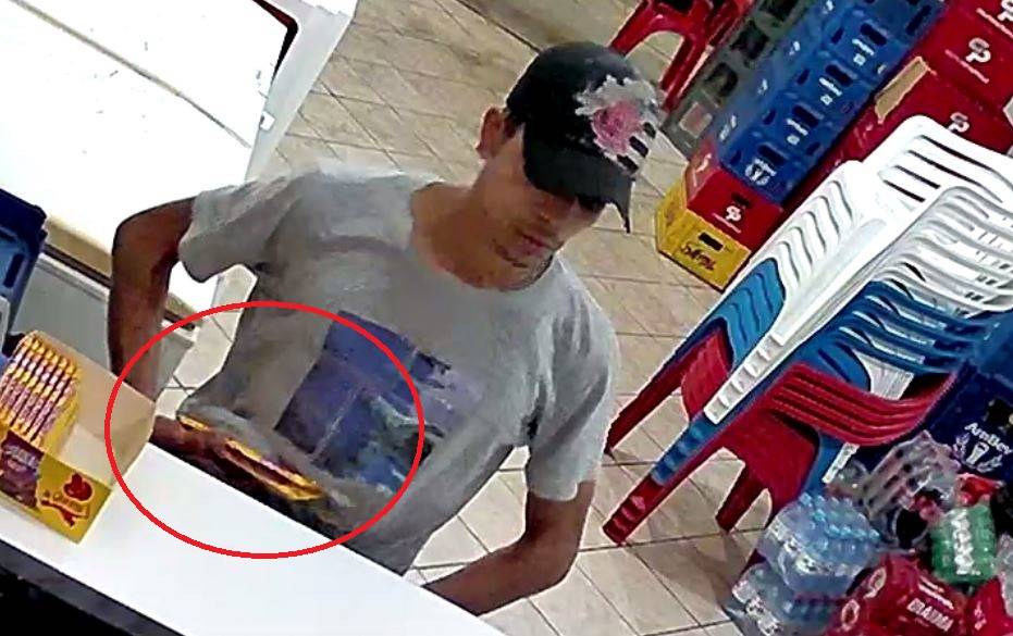 ASSISTA: câmeras mostram rapaz furtando barras de chocolate em distribuidora de bebidas, em Vilhena
