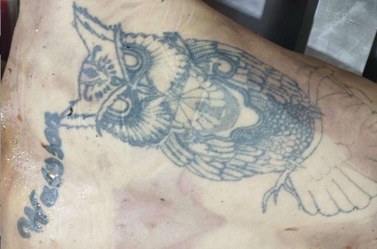 Tatuagem nas costas pode ajudar a identificar rapaz de 26 anos executado com tiro na cabeça ontem, em Vilhena