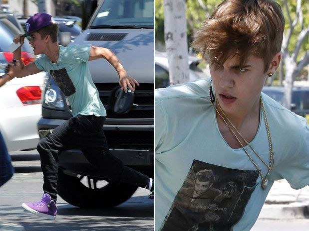 Justin Bieber perde a cabeça e parte para cima de paparazzo 