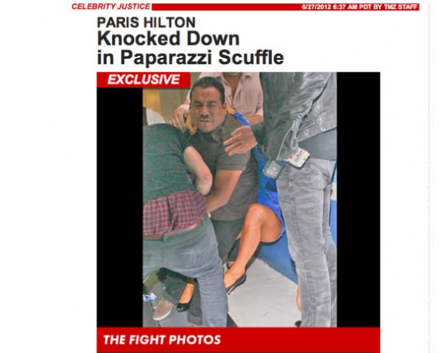 Paris Hilton briga e fotógrafo cai em cima da socialite em uma boate